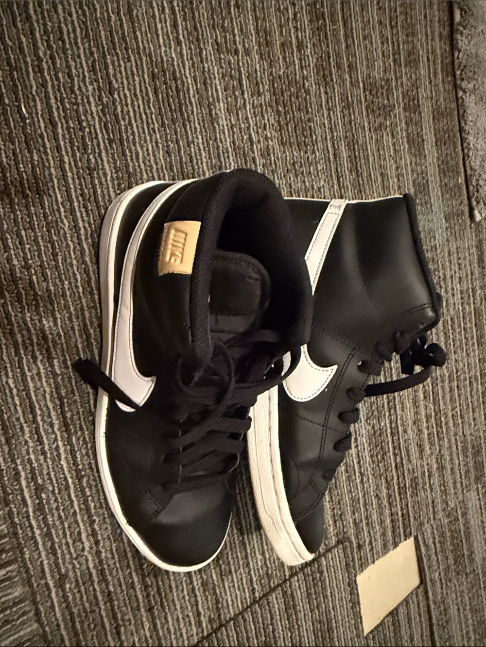 Nike Women's Black and White High-Top Sneakers with Swoosh
